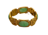 Bracelet or jaune 750 orné de pierre de jade et de motifs originaux