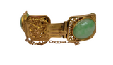 Bracelet or jaune 750 orné de pierre de jade et de motifs originaux